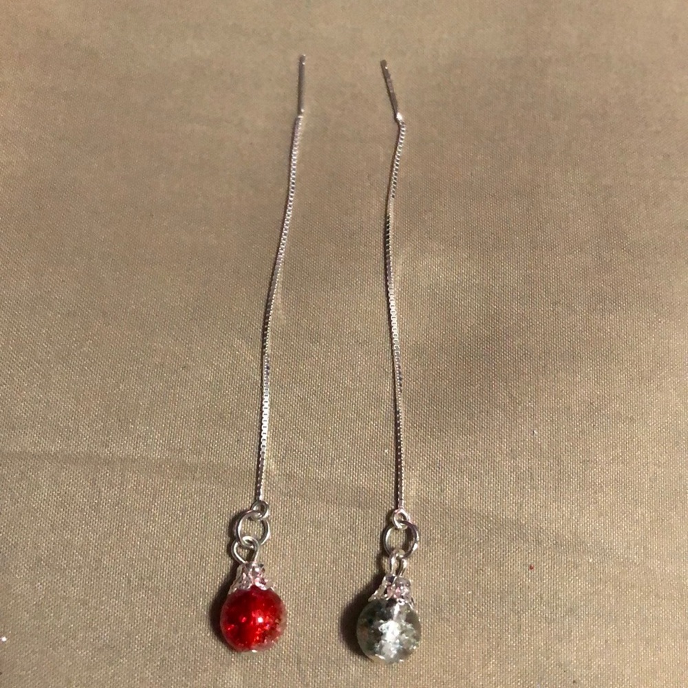 Multi colored threaded earrings.